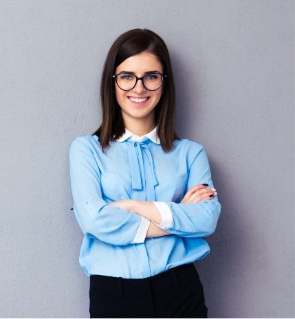 cheerful-young-businesswoman-standing-near-P5A34JE
